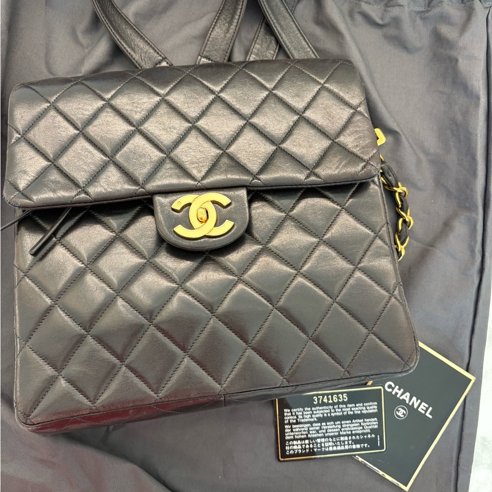Vintage CHANEL Black Quilted Backpack with 24K gold plated hardware